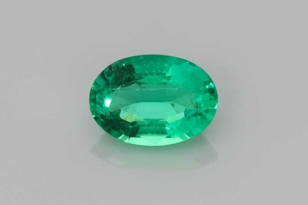 0.71 Karat Oval Form Emerald Gemstone